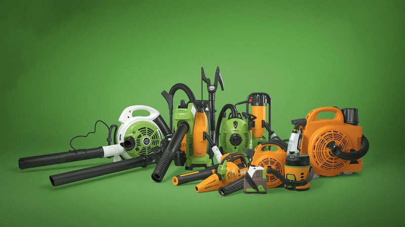 Collection of power tools including leaf blowers and chainsaws on a green background
